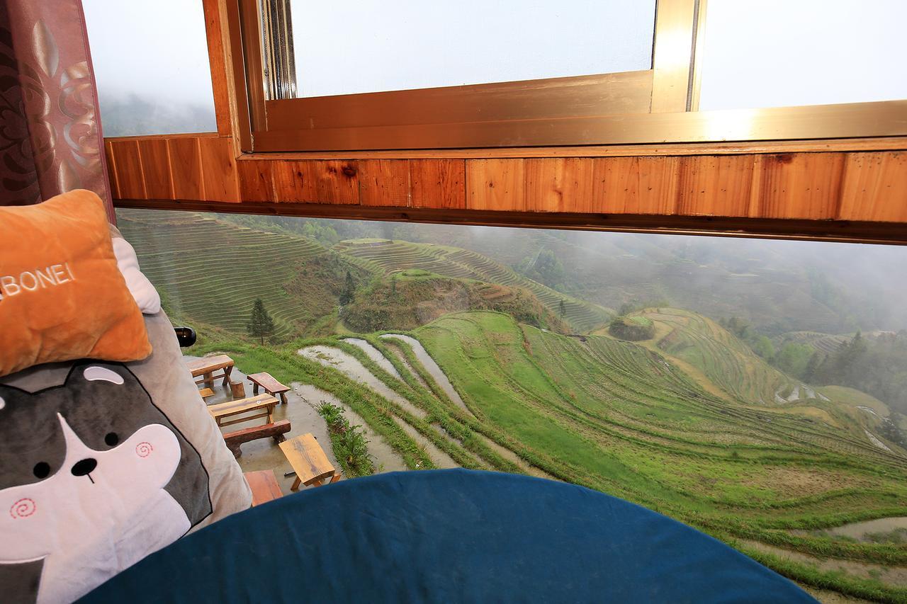 Wanjinglou Guest House หลงเซิง ภายนอก รูปภาพ